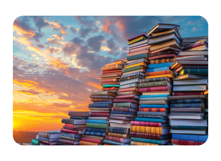 Speaker smiling in front of books